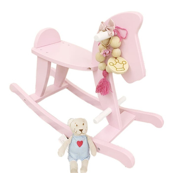 Drewniany Konik na biegunach różowy dla dziewczynki, bujak