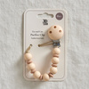 Zawieszka, klips do smoczka, gryzak beżowy JackOJuno